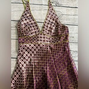 NWOT! 100% silk. BCBG stunning backless asymmetrical length dress. Size 12. New